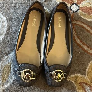 Michael Kors flats like new, no scuffs.
